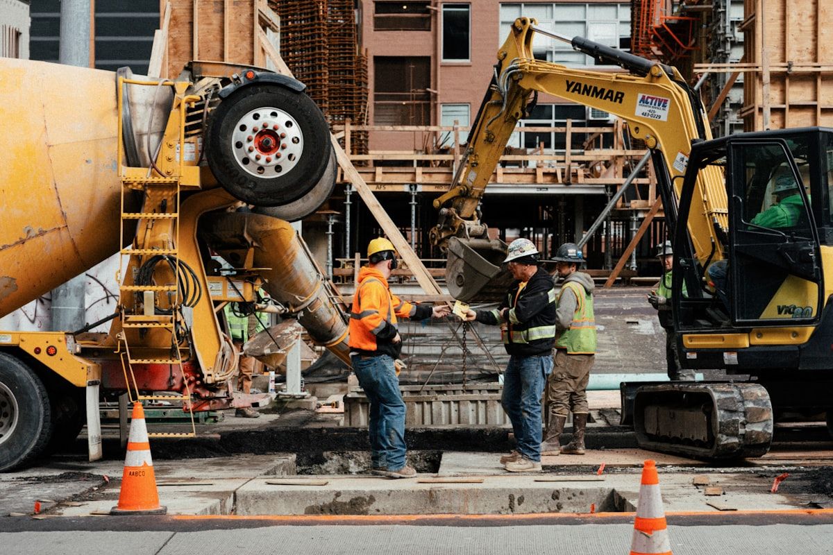 Contractors and plant on a groundworks site