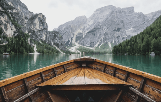 Wooden boat on a mountain lake